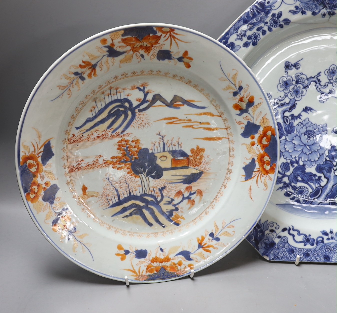 A Chinese blue and white octagonal plate with botanical decoration, together with another Chinese Imari plate with landscape decoration, 31cm diameter